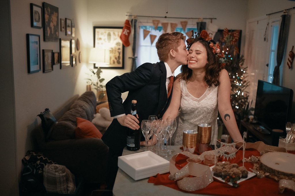 My First Full Year Working Towards FI: A Recap! - Butch on a Budget - Me kissing Cassie on the cheek